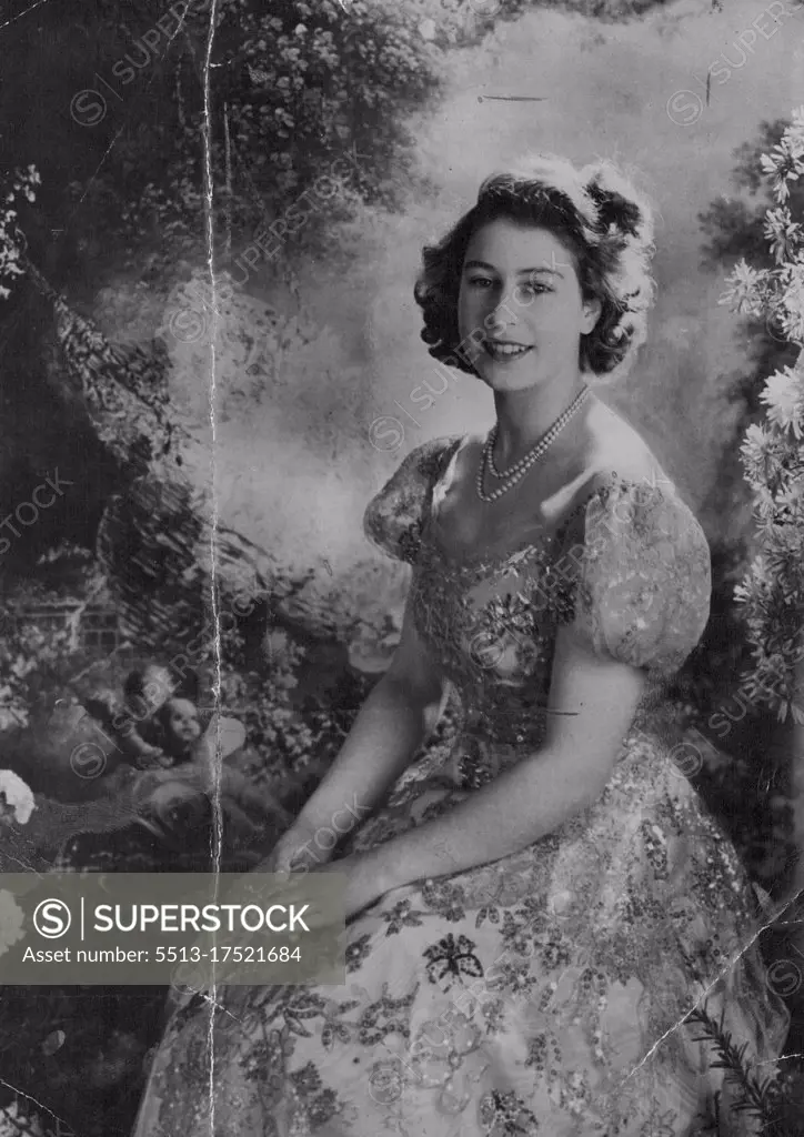 New Study Of Princess Elizabeth A charming portrait study of H.R.H. Princess Elizabeth, heir to the throne of Great Britain, taken by the artist-photographer Cecil Beaton, at Buckingham Palace, recently. Her Royal highness is wearing a rose colored lace and tulle picture dress embroidered in rose and gold with blue butterflies. June 7, 1947. (Photo by Associated Press Photo).