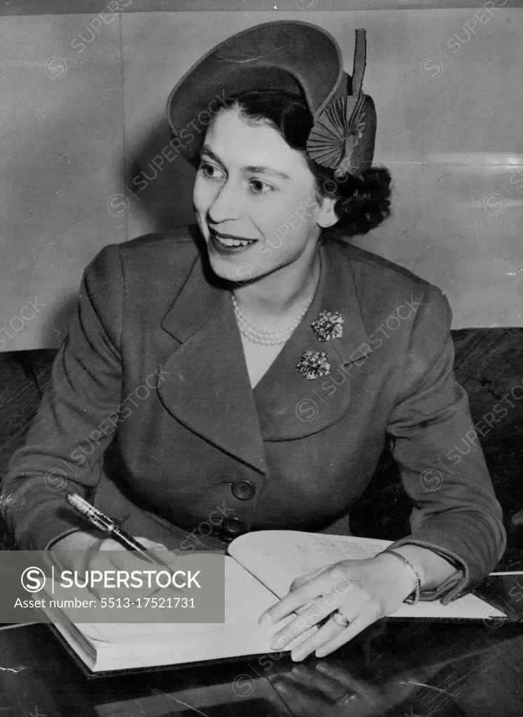 Royal Guest This Charming study of Princess Elizabeth was made as she signed the Royal Canadian Air force guest book while making the flight from montreal to Washington aboard an race plane; October 31. November 7, 1951. (Photo by Associated Press Photo).