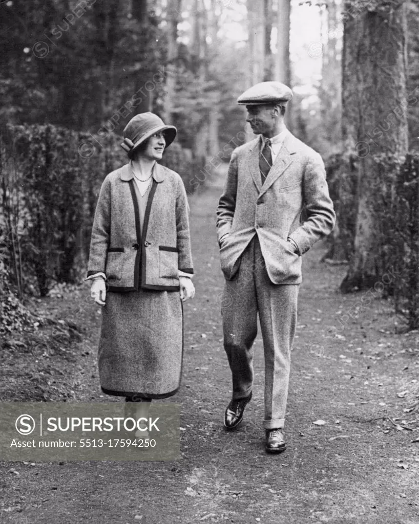 The King and Queen - then the Duke and Duchess of York - take a stroll through the grounds. They were on their honeymoon at Polsden Lacey. May 01, 1923. (Photo by Ruterphoto).