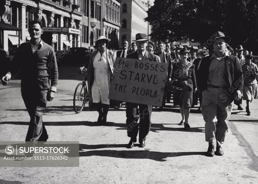 ***** to unload fruit from the Murada had been refused, Brisbane watersiders marched to ***** unloaded her cargo. Women marched with them and helped in the work. May 12, 1946.