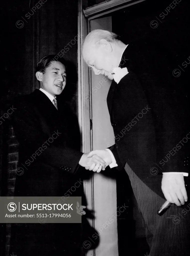 Prince Akihito Lunches With Premier -- Sir Winston Churchill (right), Britain's Prime Minister bows as he shakes hands with Prince Akihito as Japan's 19-year-old Crown Prince left number Ten Downing Street after lunching with him today April 30th. April 30, 1953. (Photo by Associated Press Photo).