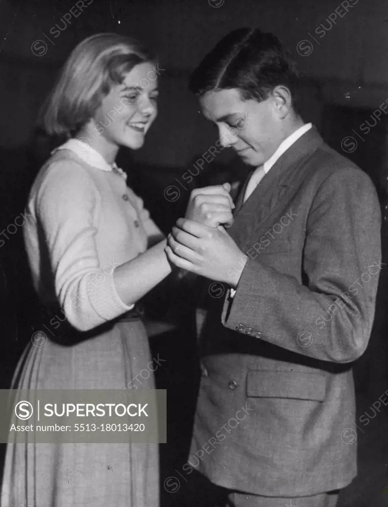 Laughter from blonde Suzanne Parrett, of Rose Bay. her Partner, Peter  Loveless, of Bondi, keeps a careful eye on his foot action. September 04,  1953. - SuperStock