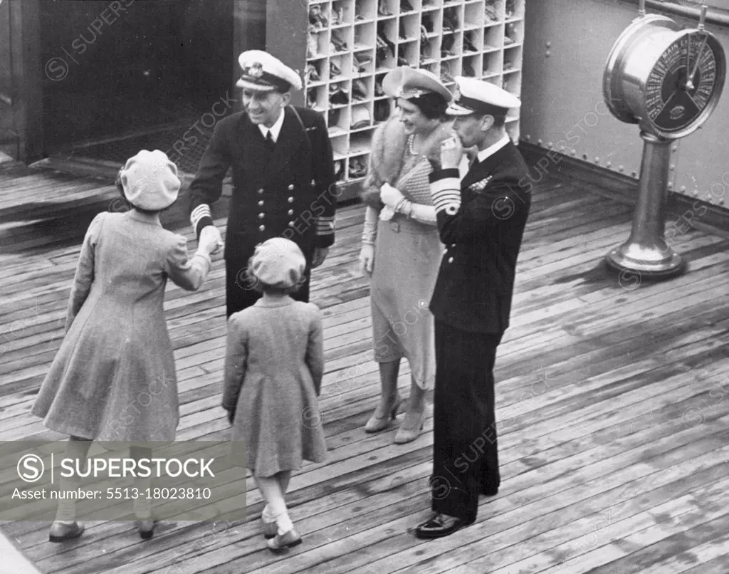 The King and Queen Home Again Family Reunion At He Docks -- With the guns of the home fleet booming a great welcome home, the King and Queen, after their triumphant tour Canada and the United States, landed at Southampton this afternoon.Their Majesties with the Princesses on the Empress of Britain. June 22, 1939. (Photo by Sport & General Press Agency, Limited).