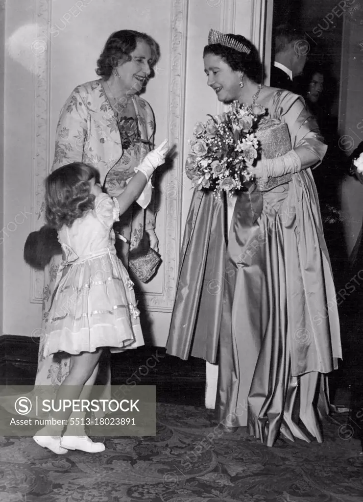 "Excuse me," said little Sarah Osborn to the Queen Mother "but what have you lot on your hair" The Queen Mother replied: "It's a tiara, my, dear." Sarah, three-year-old daughter of Sir Danvers Osborn, had just presented a bouquet to the the Mother at a performance of "Marie AntoiNette" at the Scala Theatre last night. December 03, 1953. (Photo by Daily Mirror).