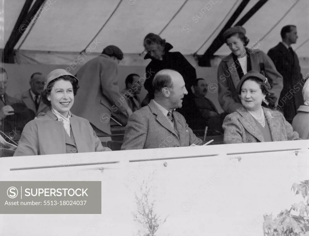 Horse Trails Delight The Queen - The Queen in new style hat to match her orange coat, smiles as her mother, Queen Elizabeth, the Queen Mother, talks with the Duke of Beaufort, master of the horse, at the dressage tests, held on the opening day of the European horse trials in Windsor great park to-day (Wednesday). May 18, 1955. (Photo by Reuter Photo).