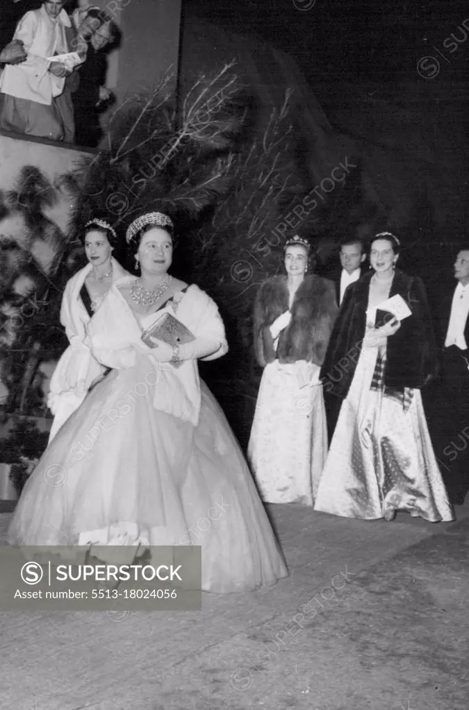 The Queen Mother And Princess Margaret In Southern Rhodesia - Queen Elizabeth the Queen Mother with Princess Margaret leaving the Theatre in the great Rhodes Centenary Exhibition now being held in Bulawayo, S.Rhodesia.The Royal Party had attended an evening concert given under the direction of the famous conductor Sir John Barbirolli. July 14, 1953. (Photo by Sport & General Press Agency Limited).