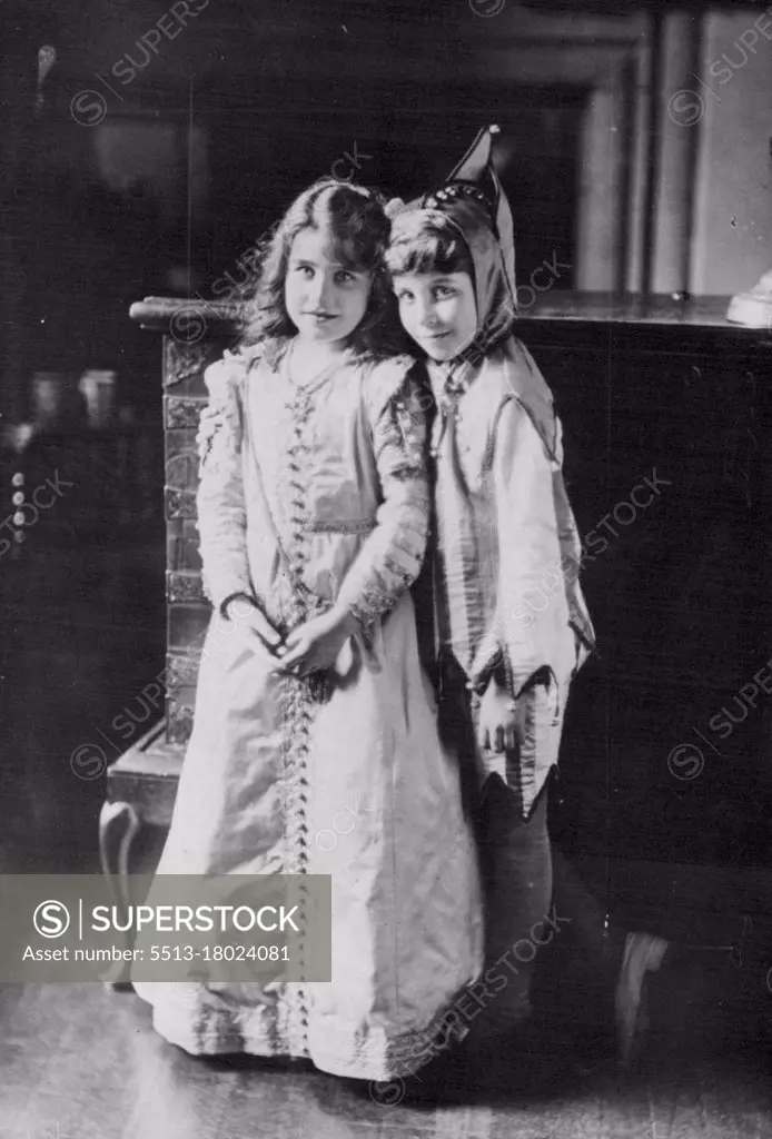 England's new Queen -- At the age of 9 -- This portrait study, made at Glamis Castle, Scotland, in 1909, shows Queen Elizabeth (then lady Elizabeth Bowes-Lyon) at the age of nine years. She is seen with her little brother David. Both are in fancy dress. December 18, 1936. (Photo by Associated Press Photo).