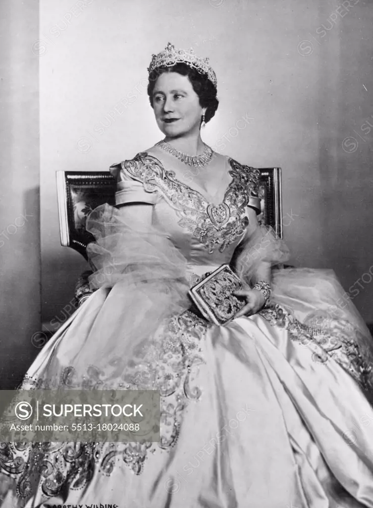 H.M. Queen Elizabeth The Queen Mother -- This new portrait study shows Her Majesty wearing a picture frock of deep oyster satin embroidered in gold and silver, with crystal beads; her jewellery and tiara are of diamonds. - The Queen Mother is on a visit to the United States and Canada; she arrives in New York on October 26th, and will visit Washington before travelling to Ottawa. She will leave New York on November 18th to return to England. October 22, 1954. (Photo by Dorothy Wilding, Camera Press)