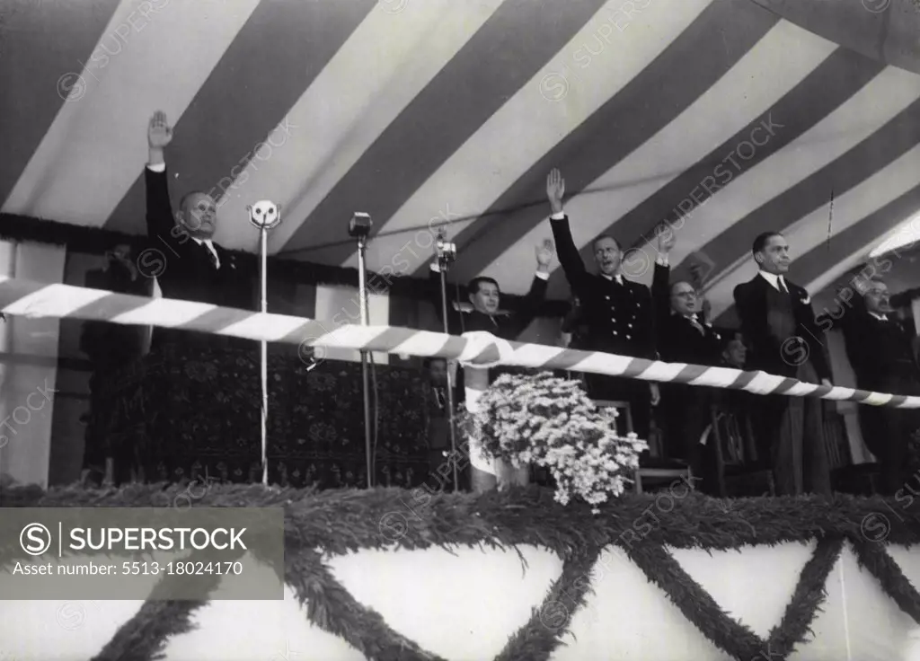 Tripartite Pact Signing Celebrated -- f. r. t. l. Foreign Minister Yosuke Matsuoka Italian Ambassador Indelli, and extreme right German Ambassador Ott, were taken as shouting Banzai, at the meeting in celebration of the conclusion of the tripartite pact which was ***** Park today. October 13, 1940. (Photo by The Domei News Photos Service).