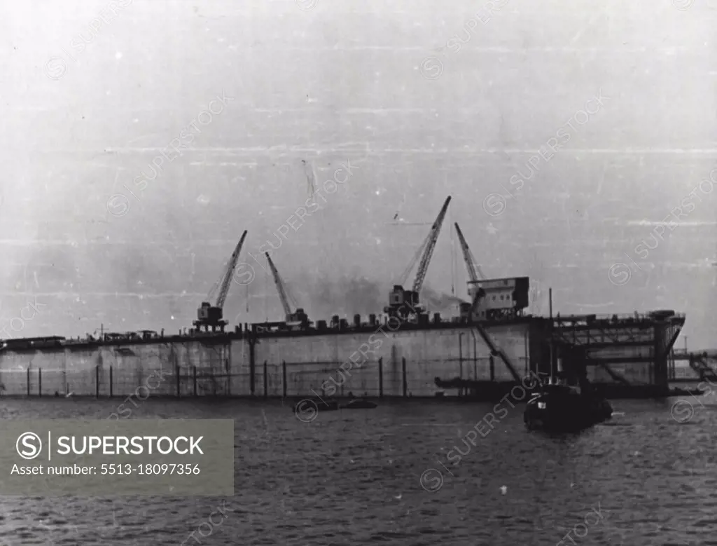 Singapore Naval Base. The Huge Floating Dock. July 28, 1941. (Photo by Ministry of Information)