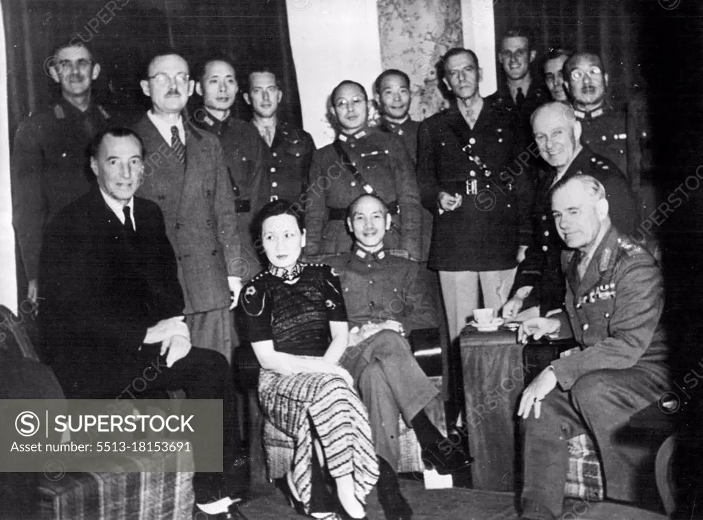 Generalissimo And Madame Chiang Kai-Shek receive General Sir Archibald Wawell and Lieut-Gen, George Brett, commander-in-chief and deputy commander-in-chief respectively, of the Allied Forces in the Southwest Pacific, on their recent visit to Chungking to confer with the Generalissimo on the Allied command, Left to right, seated, Sir Archibald Clark Kerr, Ambassador to China until January 1942, now Ambassador to U.S.S.R., Madame Chiang, Generalissimo Chiang, Lieut-Gen. Brett, General Wavell 1/2 Behind Sir Archibald Kerr is Gen. Lancelot Dennys, head of British Military Mission to China; between Sir Archibald and Madame Chiang is Ow en Lattimore personal political adviser to the Generalissimo behind Generalissimo is General Ho Ying-chin and next to him is Brig-GeneralJohn Magruder head of the American Military, Mission to China. April 10, 1951.