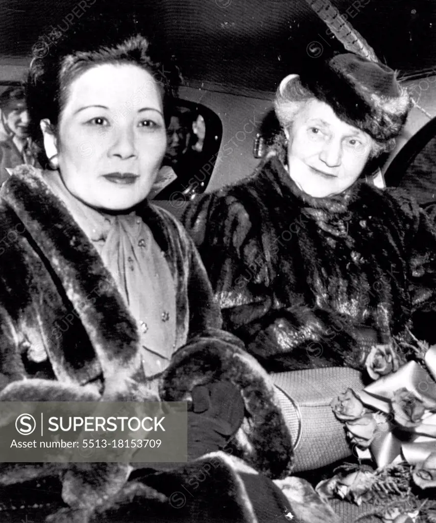 Madame Chiang In Washington -- Madame Chiang Kai-stek (left), first Lady of China,l and Mrs. George C. Marshall, wife of the secretary of state, prepare to leave Washington National Airport today after Madame Chiangs arrival here by plane. December 01, 1948. (Photo by AP Wirephoto).