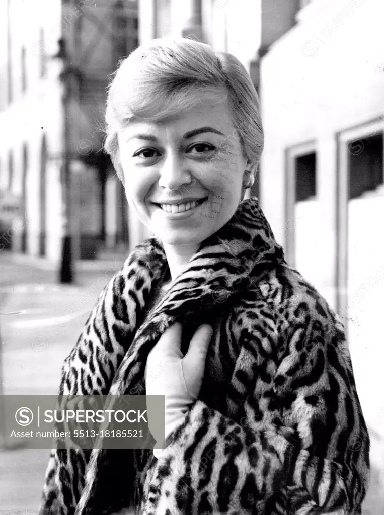 Lovely Italian film star Giulietta Masina arrives in London for premiere of The Road, which opens at the Curzon Cinema. Husband Federico was the director. December 13, 1955.