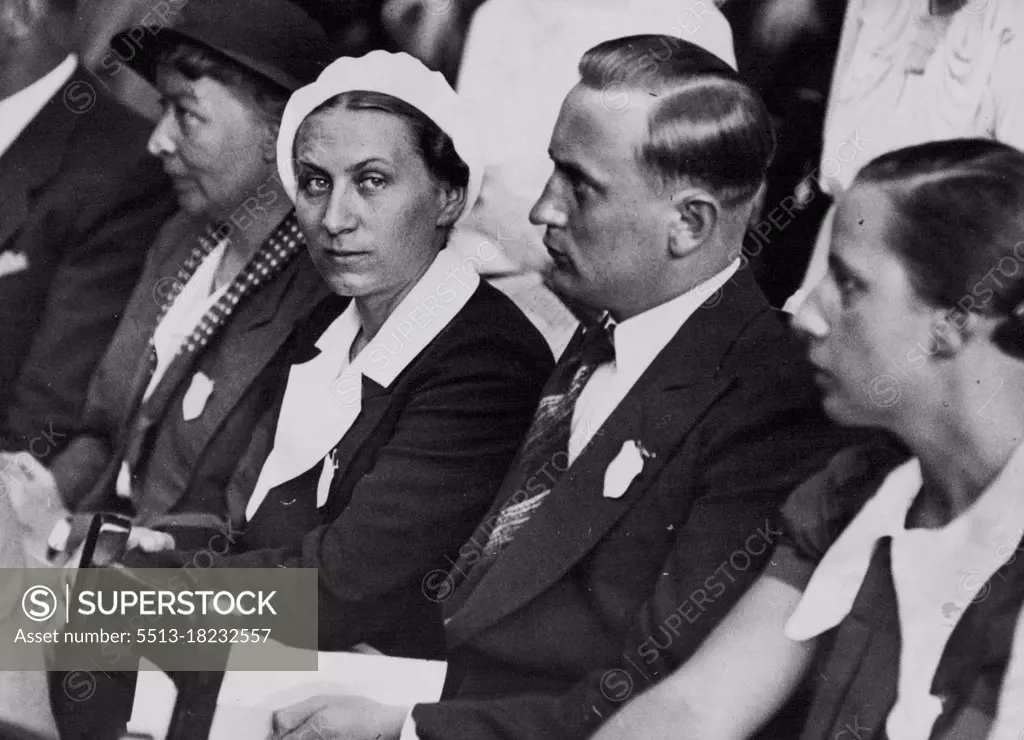 Frau Gertrud Scholtz Klink (wearing white beret) was described by Hitler as the "perfect woman." She is leader of women's organizations in Germany. The photograph was taken in London when she attended a conference on social work. July 28, 1936. (Photo by Sport & General Press Agency, Limited).