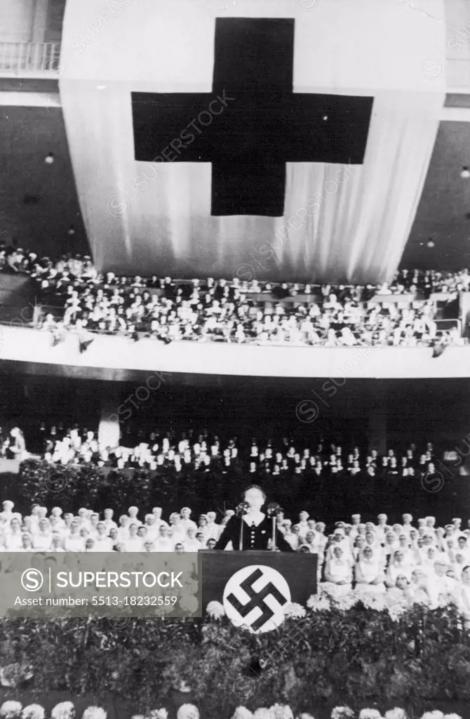 "Perfect Nazi Woman" Opens Women's Congress -- Reiche Women's Leader, Frau Scholtz-Klink (the Perfect Nazi Woman) addressing the meeting.A congress to celebrate the 70th anniversary of the foundation of the German Women's Red Cross Association was opened yesterday in the Deutschland Hall in Berlin, in the presence of 15,000 Red Cross from all parts of Germany. December 11, 1936. (Photo by Keystone).