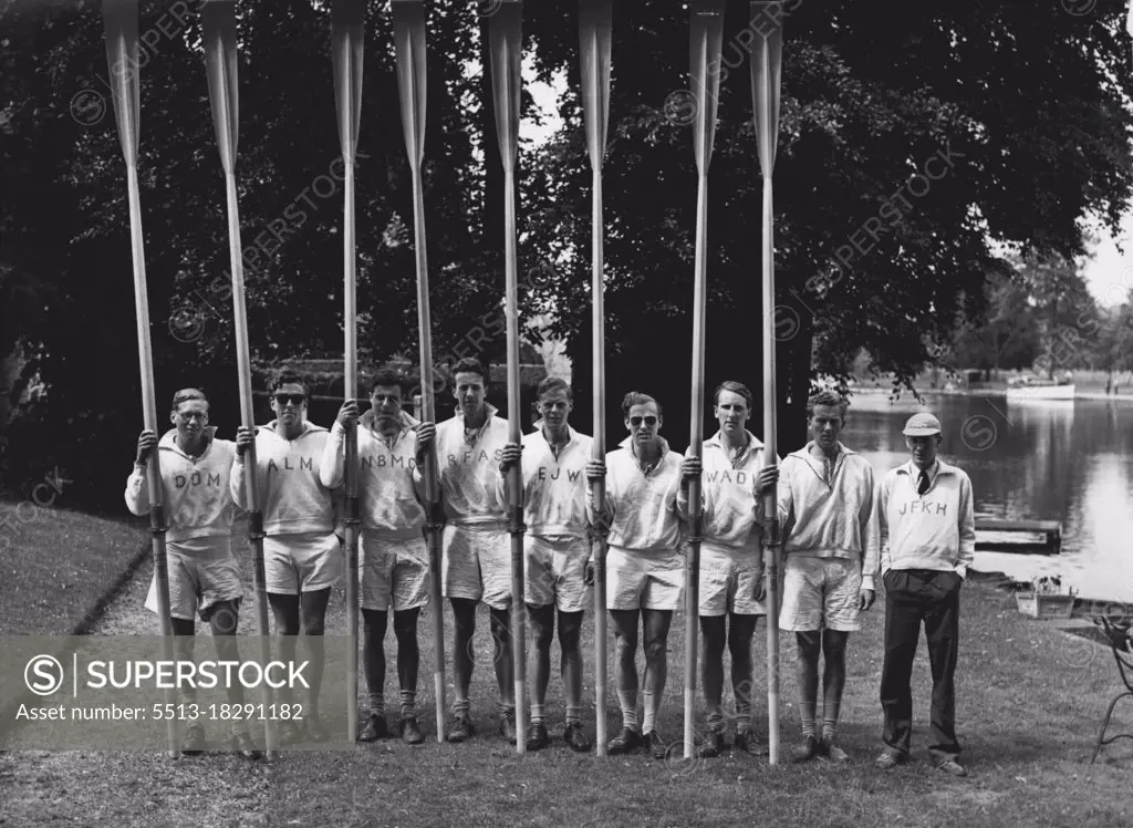 Light Blue Eight To Row Olympic Boat - The Cambridge Olympic crew photographed on the river between Marlow and Henley where they are engaged in training. They are, left to right: D.D. Macklin (bow), A.L. McLeod, N.N.B. Clack, R.F.A. Sharpley, E.J. Worlidge, C.B.M. Lloyd, W.A. Windham, D.M. Jennens (stroke), and J.F.K. Hinde (cox).The Cambridge University Leander Club eight has been chosen to represent Britain in the Olympic Regatta. The crew includes six of the successful Camoridge 1951 eight, and one of the 1950 Steering will be J.F.K. Hinde, Cambridge cox for the past two years. June 13, 1952. (Photo by Fox Photos).