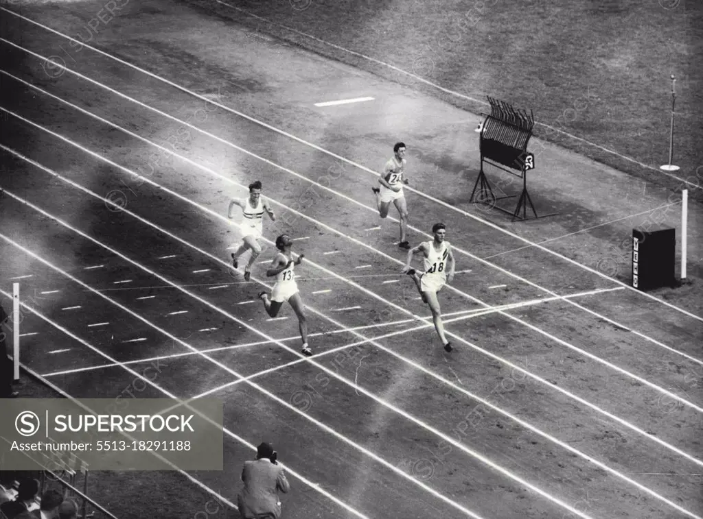 Treloar Wins 200 Metre Heat - John Treloar of Australia (No. 18) wins heat 18 of the Olympic 200 metre sprint at Helsinki's Olympic stadium yesterday, July 22.Second was L.T. Pinto of India (137) and third P. Karadi of Hungary (932). Treloar's Time was 21.5 seconds. July 23, 1952. (Photo by The Associated Press Ltd.).