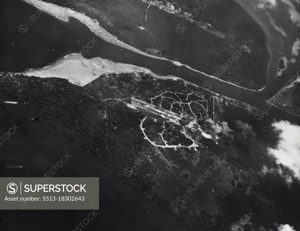 Bonis airstrip at  Buka passage looked like this after the first of several bombing attacks by Navy carrier aircraft on a 1 November. The jungle airfield is surrounded by a network of Jap-built roads. December 28, 1943. (Photo by U.S. Navy Photo).