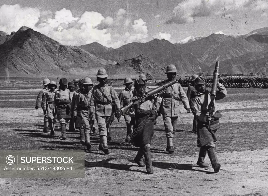 Tibet Army Commanders - These Depons (Colonels or Junior Generals) are typical of the Tibet Army which now faces Chinese Communists reported to be approaching Lhasa, the Tibetan capital. They are wearing long earrings, The organisation of the Tibetan army goes no higher then the regiment, usually of 500 men, commanded by a Depon. Security measures are being taken along India's Frontier with Tibet because the country that is known as the roof of the World is considered to have very little chance against the invaders. The Tibetan Army, though very determined and with a very high morale is certainly no match against Chinese Communists, The Tibetans are entirely dominated by religious loyalty to the Daksi Kana and to their priestly government. November 9, 1950.