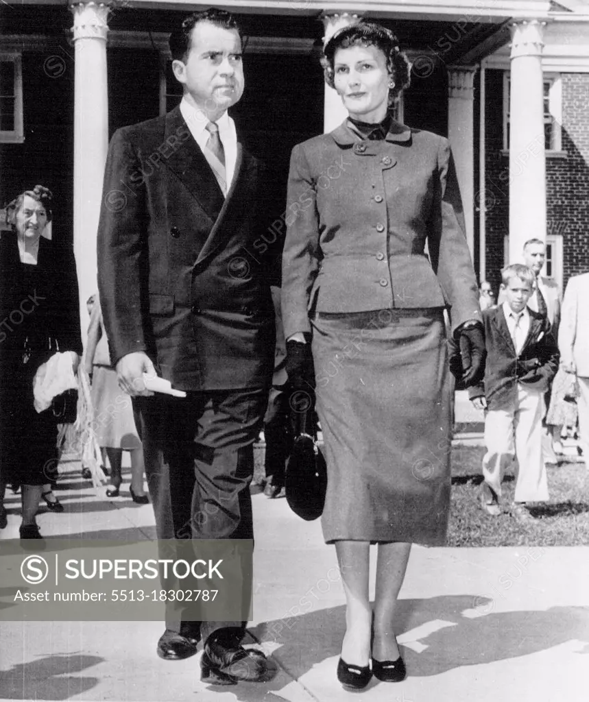 Nixons Leave Church -- Vice President Richard Nixon presents a grave expression as he and Mrs. Nixon leave the Westmoreland Congregational Church after attending a morning service today. A short time later Nixon said "the business of the government will go on as usual without any delay because of President Eisenhower's temporary absence." September 25, 1955. (Photo by AP Wirephoto).