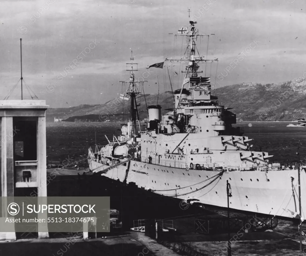 British Cruiser In Persian Gulf --  The cruiser Mauritius during a visit to Trieste. It was announced by the British Foreign Secretary, the Rt. Hon, Herbert Morrison, that the British Government has ordered the ***** ton cruiser H.M.S. Mauritius to the vicinity of Abadan, near the Anglo Iranian Oil Compan's refineries.The 'Mauritius' is Flagship of the East Indies Fleet and is commanded by Captain E.O.F. Price. She carries a complement of 800 officers and men and mounting a main armament of nine six inch guns, she is capable of doing over 30 knots. Abadan lies on the west bank of the Shatt-al-Arba river, about 30 miles from its mouth, and the shallow draught of the cruiser Mauritius will enable her to sail up river. July 24, 1951. (Photo by British Official Photograph).