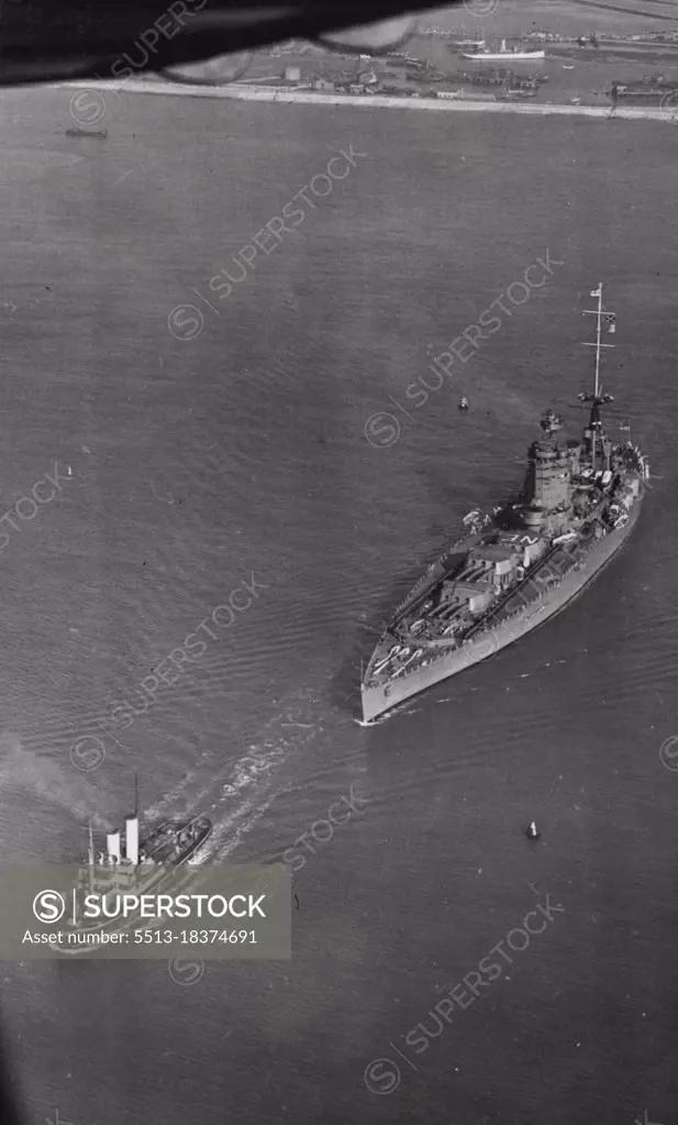 Off For Home Fleet Cruise -- An aerial view of H.M.S. Nelson first Battleship of the Home Fleet leaving Portsmouth for Portland for the Home Fleet's Spring Cruise. May 22, 1939. (Photo by London News Agency Photos Ltd.).