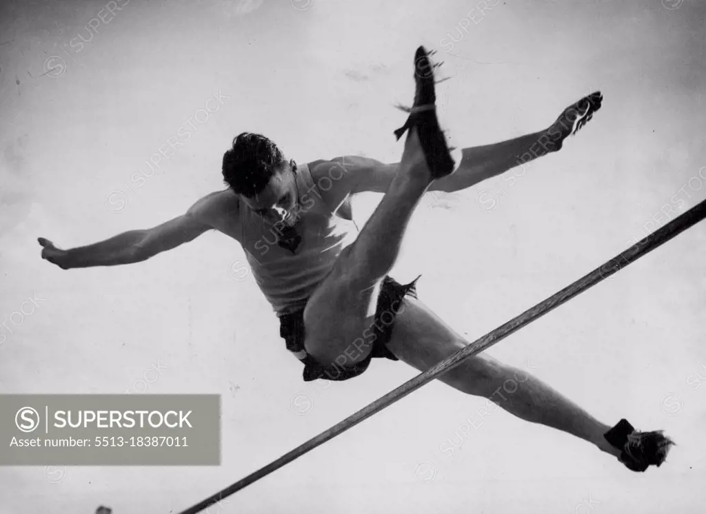 Doug Stuart (NSW) clears 6ft. 2in. in the Australian title high jump at Adelaide yesterday. The effort gained him only equal second place to Olympic winner, John Winter, who won yesterday with a jump of 6ft. 4in. January 3, 1950. 