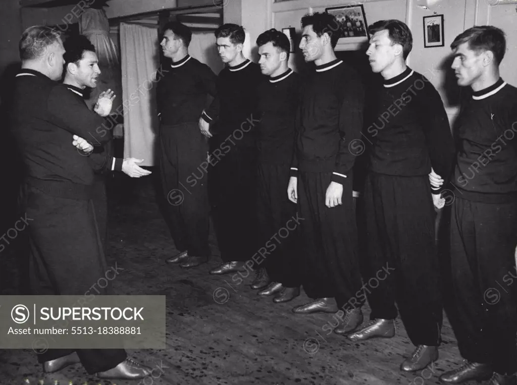 Russian Boxers Train Again - Members of the Russian boxing team here to fight against Great Britain at Wembley on Wednesday, receive instructions from their coaches during another spell of training at Blooms gymnasium today. October 10, 1955.