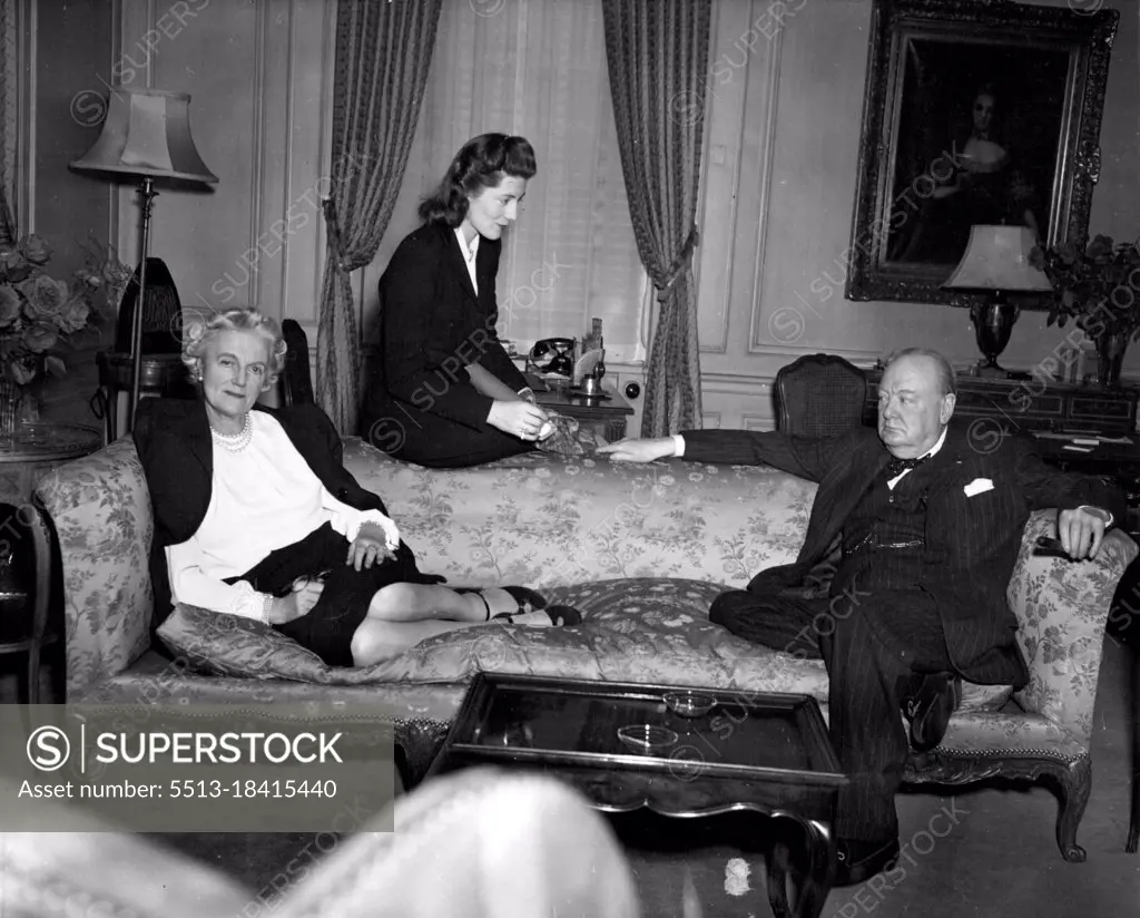 Churchills RelaxWinston Churchill, The former Prime Minister of Great Britain His wife and daughter, Mrs. Sarah Oliver, enjoy a moment of relaxation in their suite at the Waldorf - Astoria here. Since Their Arrival in The U.S. for a vacation, The Churchills have followed a Gruelling schedule of travel and sight - seeing dinners and speeches. This occasion was just prior to their departure for England. March 21, 1946.