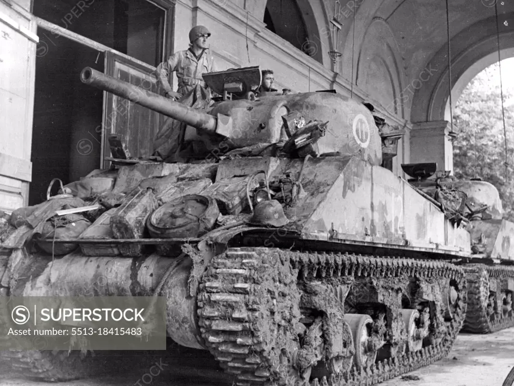 This Sherman tank of a New Zealand armoured division with the Eighth Army in Italy played an important role in Capturing an Italian city.Canadians, New Zealanders and Greeks combined in the assault. November 13, 1944. (Photo by Canadian W.I.B).