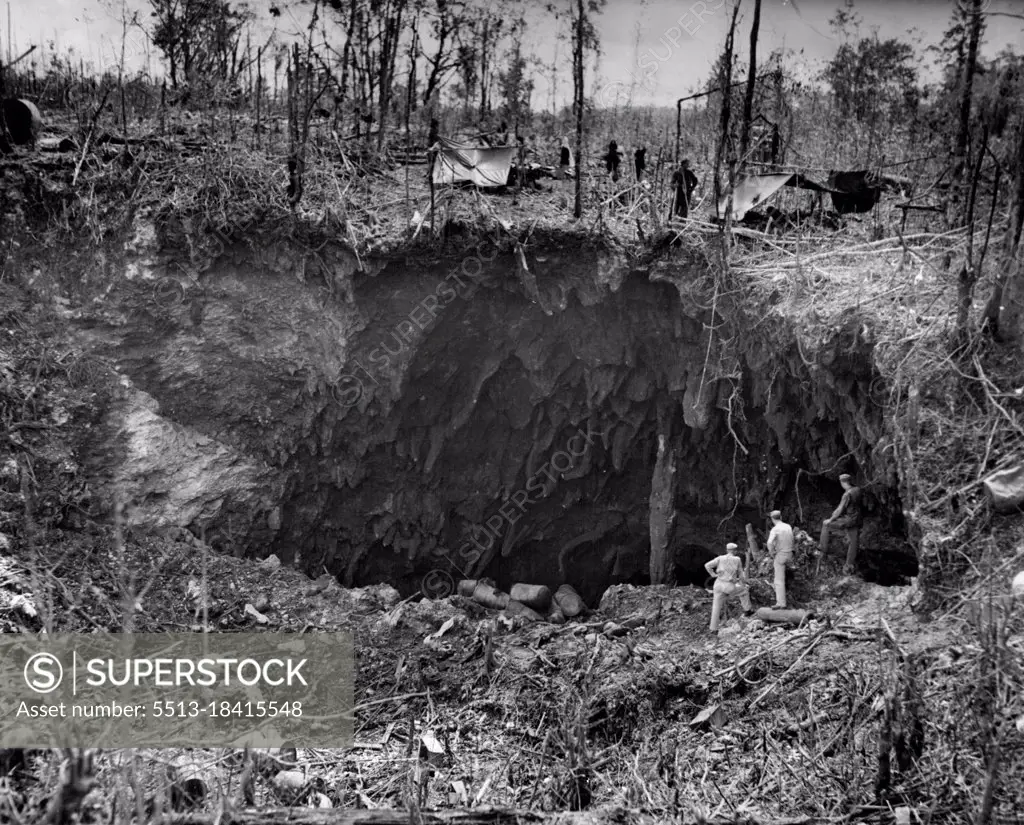 Caves Hid Japs - Huge yawning caves, similar to this one, were employee by the Japanese on Biak Island, off the Coast of Dutch New Guinea, in a vain effort to halt U.S. forces. The Nips had 81 mm mortars and ack-ack guns in this one to harass the Yank advance. July 7, 1944. (Photo by USA Signal Corps).