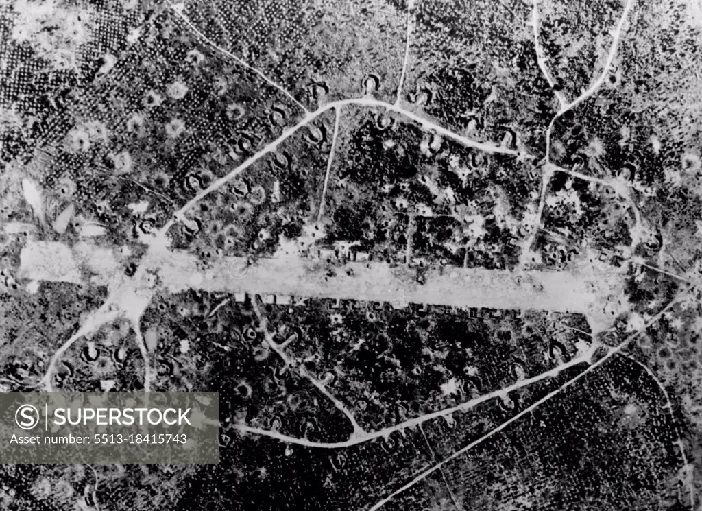 Much-bombed Japanese airstrip on New Ireland in the Southwest Pacific. The strip one of those guarding Rabaul has been rendered practically useless by continual bombing by Allied planes. April 4, 1944. (Photo by Official U.S. Navy Photograph). 