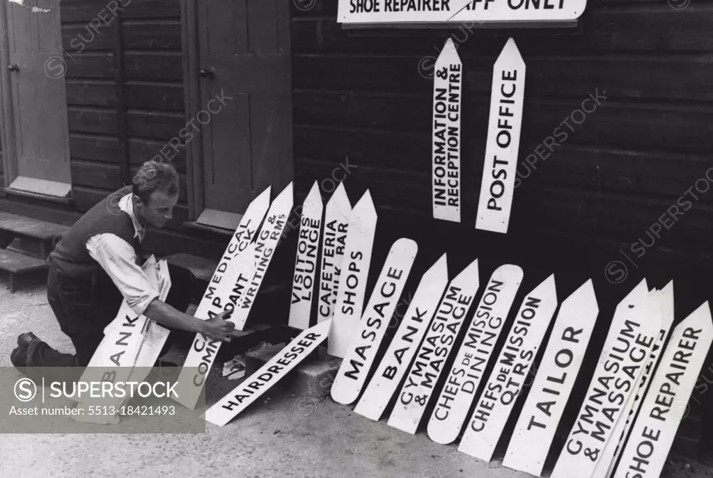 Olympic Accommodation - Sign painters are busy preparing the many signs needed for the guidance of competitors."Olympic Town" is being built in Richmond Park, Surrey, where final touches are now being put to the camp, where the participants in the Olympic games will be housed. May 29, 1948.