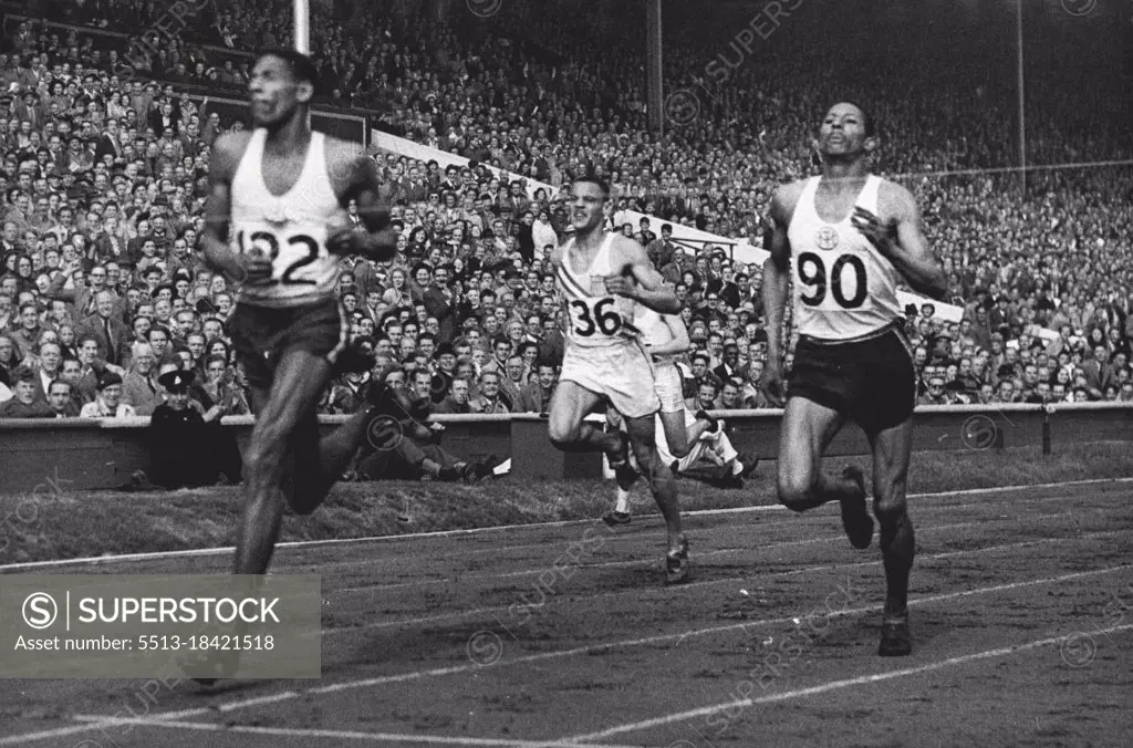 Olympic Games 1948 - ***** 400 metres final - Arthur Wint of Jamaica gaining for the British Empire the first Olympic win, when he won the Final of the 400 metres in 46.2 sec. (equalling the Olympic record) from Herbert McKenley, Jamaica, second and M. Whitfield of the U.S.A. who was third. August 05, 1948.