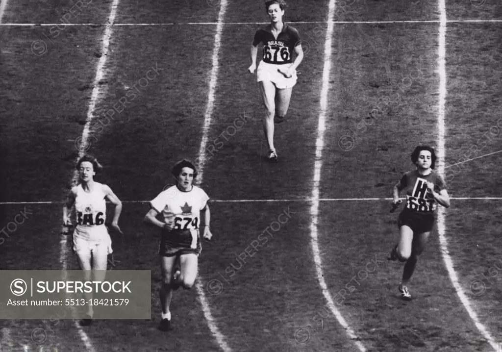 Olympic Games: New Olympic Record Women's High Jump - A. Coachman (U.S.A.) set up a new Olympic record when the she won the final of the women's high jump at Wembley today (Sat.) with a jump of 5ft. 6½ inches. August 07, 1948. (Photo by Olympic Photo Association).