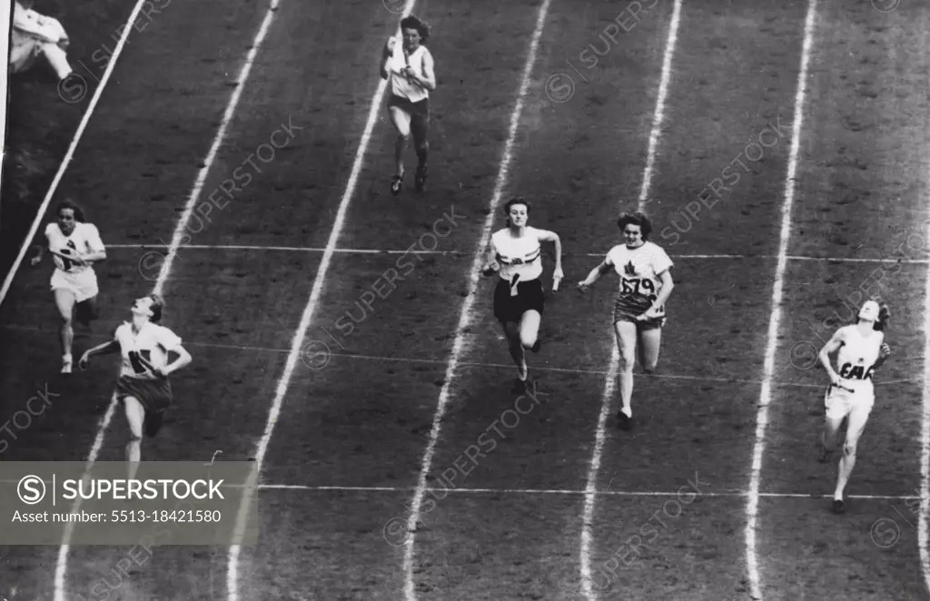 Olympic Games : The finish of the final of the 400 metres Women's relay which was won by Holland (team K) from Australia (Team A) and Canada (Team D), Great Britain (Team J), Denmark (Team F) and Austria (Team B), ***** Wembley today. August 07, 1948. (Photo by Olympic Photo Association).