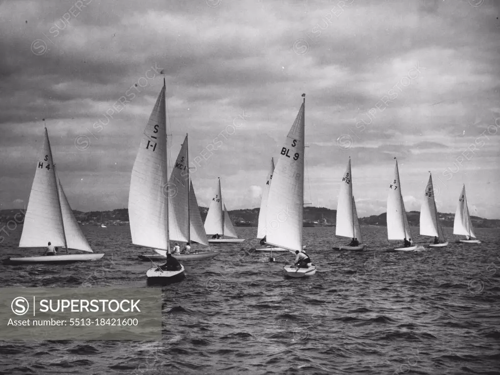 Britain's First Success In Olympic Yachting : Swallow Class Yachts jockeying at the start of their race in Torbay August 4, when Great Britain recorded her first Olympic Games Yachting win. Yacht K.7, the "Swift," sailed by S.H. Morris, won the event in 1 hour, 56 minutes, 54 seconds. The Canadian entry "Scaup" (K.C.1), sailed by J. Robertson was second, with Sweden's "Chance" (S.2) Third, other vessels unidentifiable are, H. 4 (Holland's "St. Margriet"), L.1 (Italy's "Enotria".) K.10 (Eire's "The Cloud"), BL.9 (Brazil's "Andorinha"), P. 12 (Portugal's "Symphony"), and U.I (United States" "Margaret"), sailed by lockwood pirie. August 5,  1948. (Photo by Olympic Photo Association).