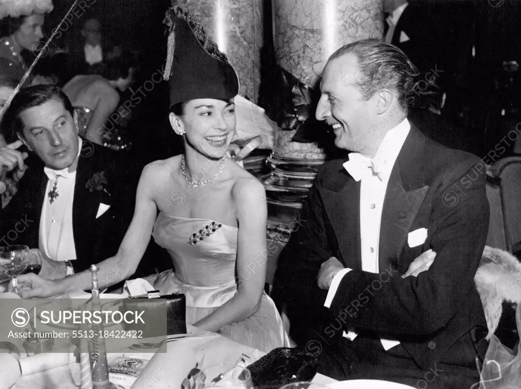 Coronation Ball At the Savoy - Ballerina Margot Fonteyn wore a fancy dress hat with her satin and tulle gown at the ball last night. She has star shaped earrings and a matching necklace, with a leaf pattern brooch on her dress. June 03, 1953. (Photo by Evening Standard Picture).