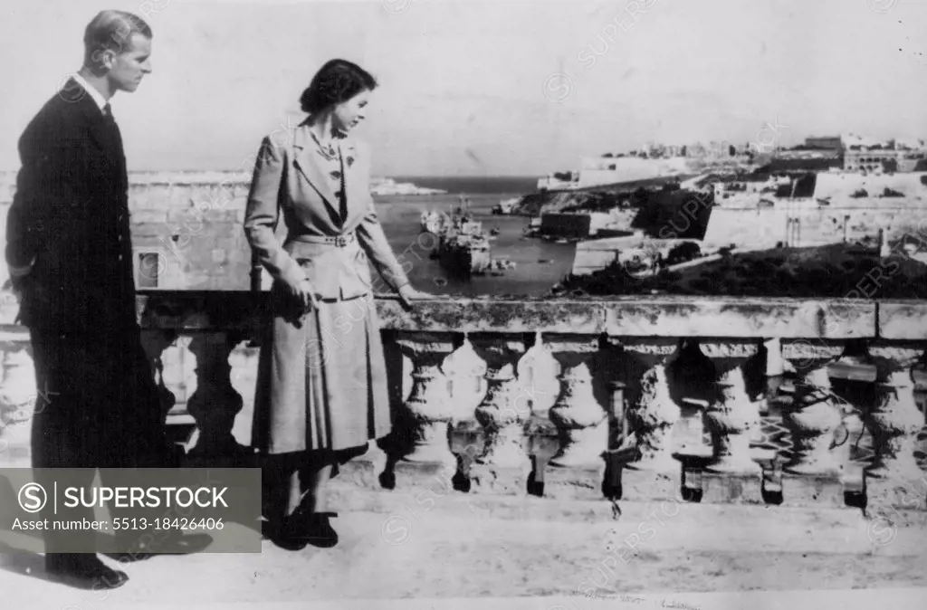 Royal Pair View Valetta Scenery -- Britain's Princess Elizabeth and the Duke of Edinburgh view Velveeta harbour and part of the town from the roof of the villa Guardamangia to-day November 23. The Princess flew out to join her seagoing husband for their second wedding anniversary three days ago. November 23, 1949. (Photo by Associated Press Photo).