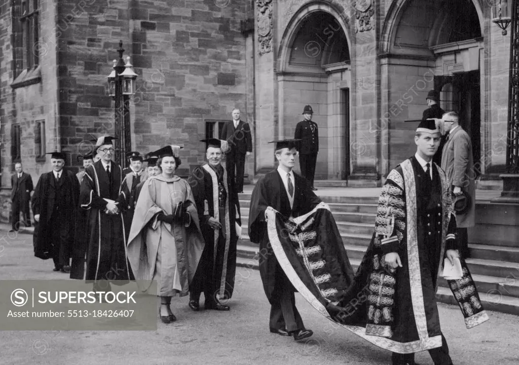 Duke of Edinburgh Confers Degree On Princess -- Philip leading the procession on leaving the college after the ceremony, followed by Princess Elizabeth. The Duke of Edinburgh, newly installed chancellor of University of Wales, conferred the honorary degree of Doctor of Music on Princess Elizabeth - his first duty after the installation ceremony. Mr. Clement Attlee, British Premier, was among others receiving degrees from the Duke. Crowds thronged the flag-lined streets of Bangor to welcome the royal couple as they drove through. April 28, 1949.