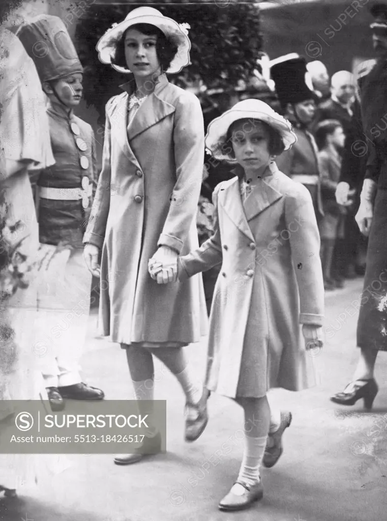 "Wooden Soldiers" Form Guard of Honour For Queen Mary And The Princesses. Princess Elizabeth and Princess Margaret as they left through the guard of honour. Dressed in the uniforms in which they give the "Wooden soldiers" in at the Show, boys of the Duke of York's School (Dover) formed a guard of honour for Princess Elizabeth and Princess Margaret when they left with 'Queen Mary after watching the Royal Tournament at Olympia, London. May 22, 1939. 