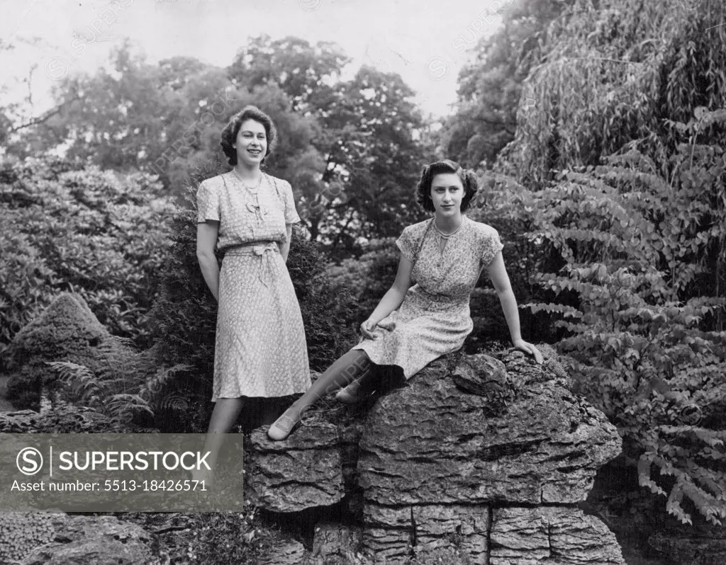 Their Royal Highnesses Princess Elizabeth and Princess Margaret in the rock gardens at Royal Lodge, Windsor. March 24, 1947.