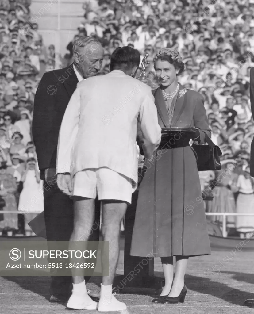 Pleasure showed on the Queen's face when she was introduced to Davis Cup players at Kooyong. March 15, 1954.