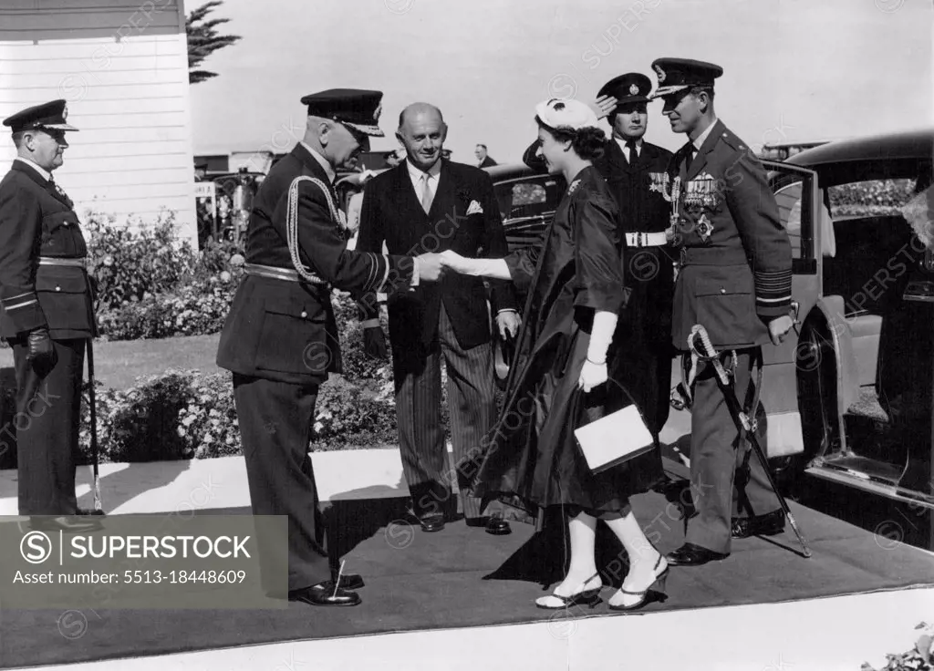 Royal Tour Victoria. The Queen and the Duke of Edinburgh as Marshal of the Royal Air Force welcomed at the R.A.A.F. Station Point Cook. From left Air Marshal Macaulay and the Minister for Air Mr. McMohon. March 12, 1954.