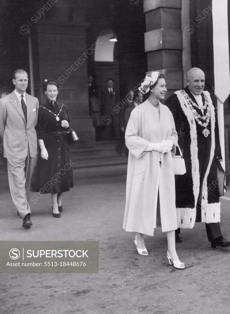 Queen Elizabeth and the Duke of Edinburgh on arrival at Dunedin (NZ) Railway Station. With them is the Mayor of Dunedin, Mr. L. M. Wright and his wife.February 04, 1954.