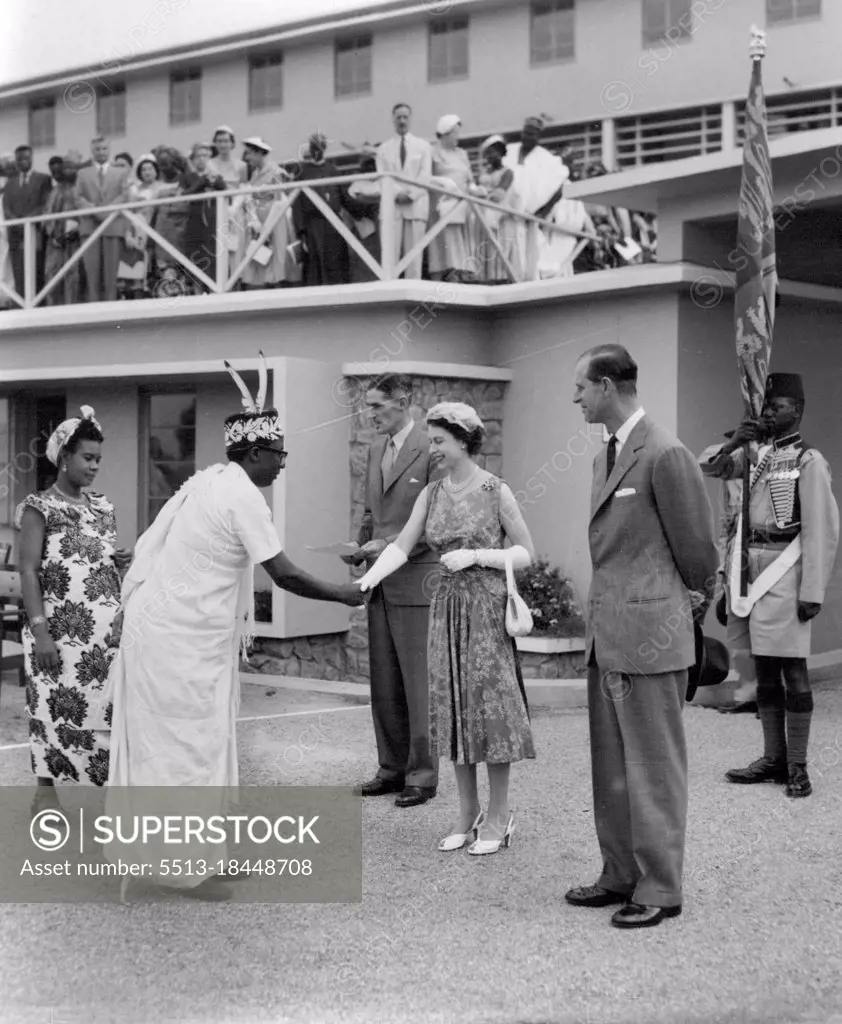 Royal Tour Of Nigeria -- ***** Shakes Hands With The Leader Of The Opposition ***** at Ibadan yesterday when she opened the new ***** Received By Air. February 28, 1955. 