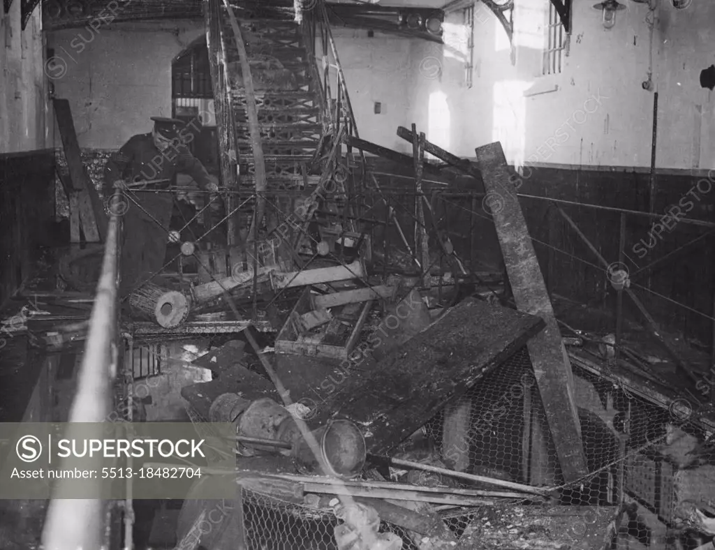 More "Glass House" Riots -- An interior view of the Wrecked detention barracks at Northallerton, Yorkshire, after the riot had been subdued yesterday March 1. Another riot broke out in an army "glass house" yesterday March 1, this time in the military detention barracks at Northallerton, Yorkshire, which were Wrecked and set on fire by soldiers service sentences of imprisonment. The Olivia fire service was called in to deal with the blaze but their Wreck was hindered by rioters throwing bricks and slates at them. March 13, 1946. (Photo by Associated Press Photo).