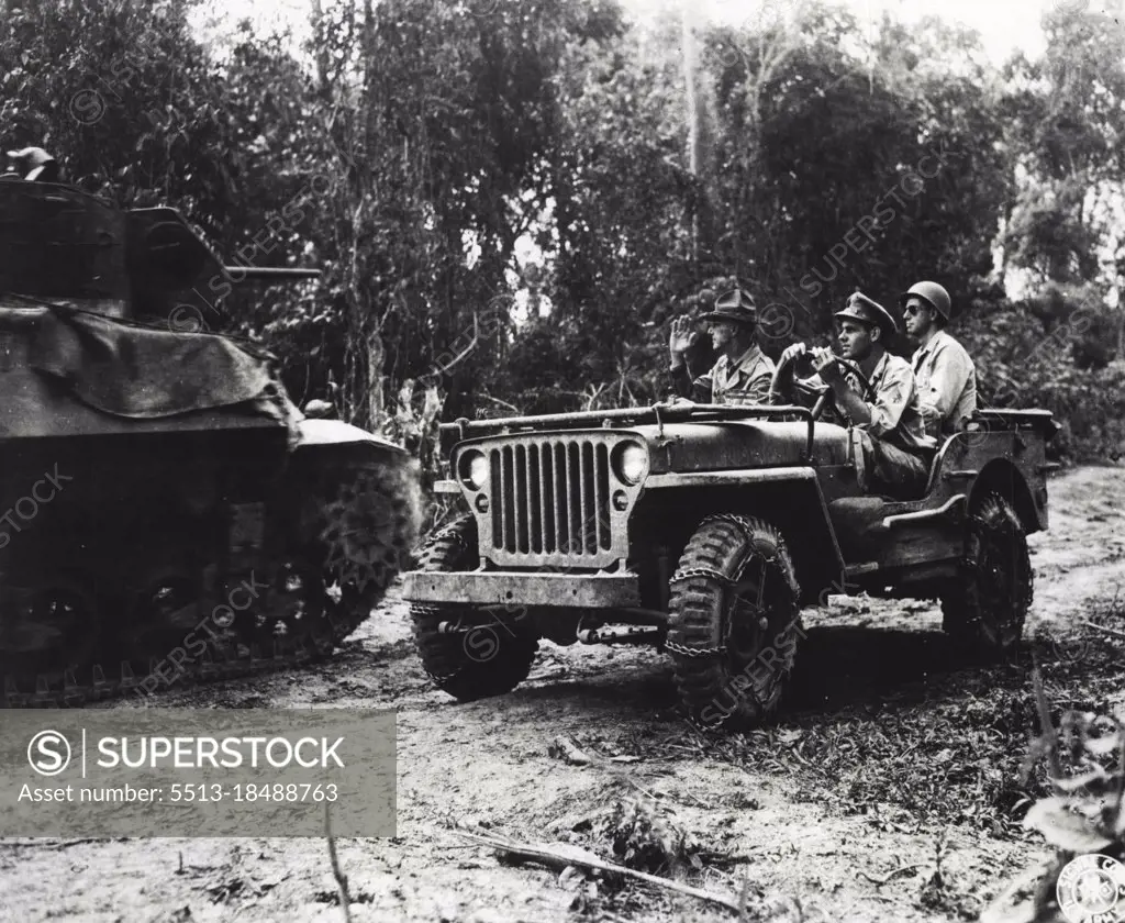 Lt. Gen. Joseph W. Stilwell returns a salute from a Chinese tank driver as Chinese tanks move toward Northern Burma front. July 24, 1944. (Photo by U.S. Army Signal Corps Photo).