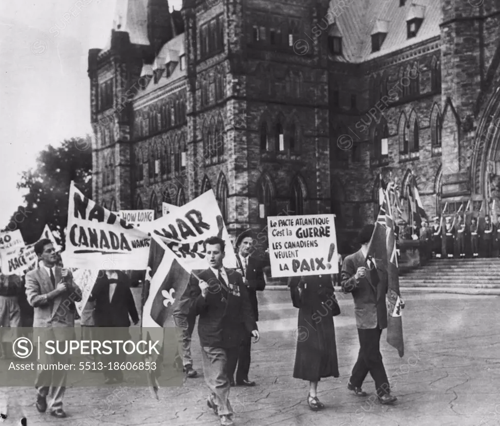 Picketing Nato Opening - ***** parade in front of the Parliament building ***** afternoon protesting the North Atlantic peace pact ***** Some pickets shouted, "Yanaks Go Home" and "We ***** Want War". September 15, 1951. (Photo by AP Wirephoto).