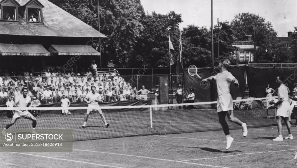 Lew Hoad and Rex Hartwig, Aussie doubles team, right, are seen in action against Don Fontana and Bob Bedard in the Davis cup tie at Mount Royal Tennis club in Montreal. Hoad, nearest camera, has just returned a backhander. The Aussies won the doubles 6-3, 3-6, 6-3, 6-4 to give Australia a 3-0 lead in the best of five series. August 9, 1955. (Photo by AP Wirephoto).